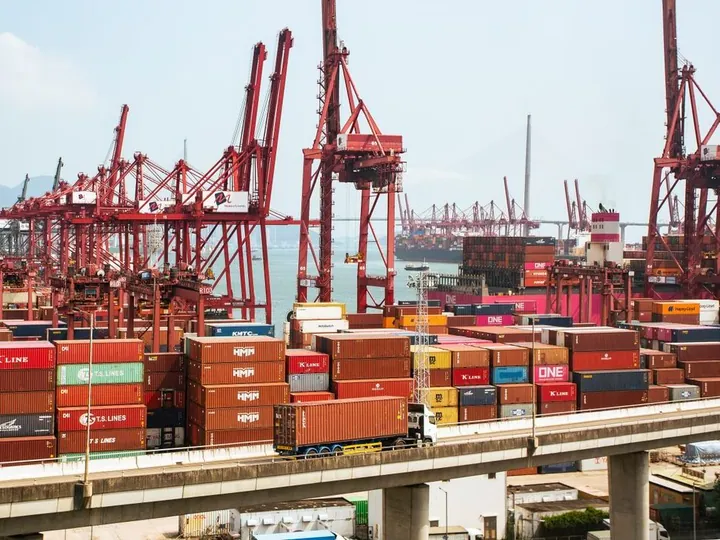 Cargo containers and cranes at a port